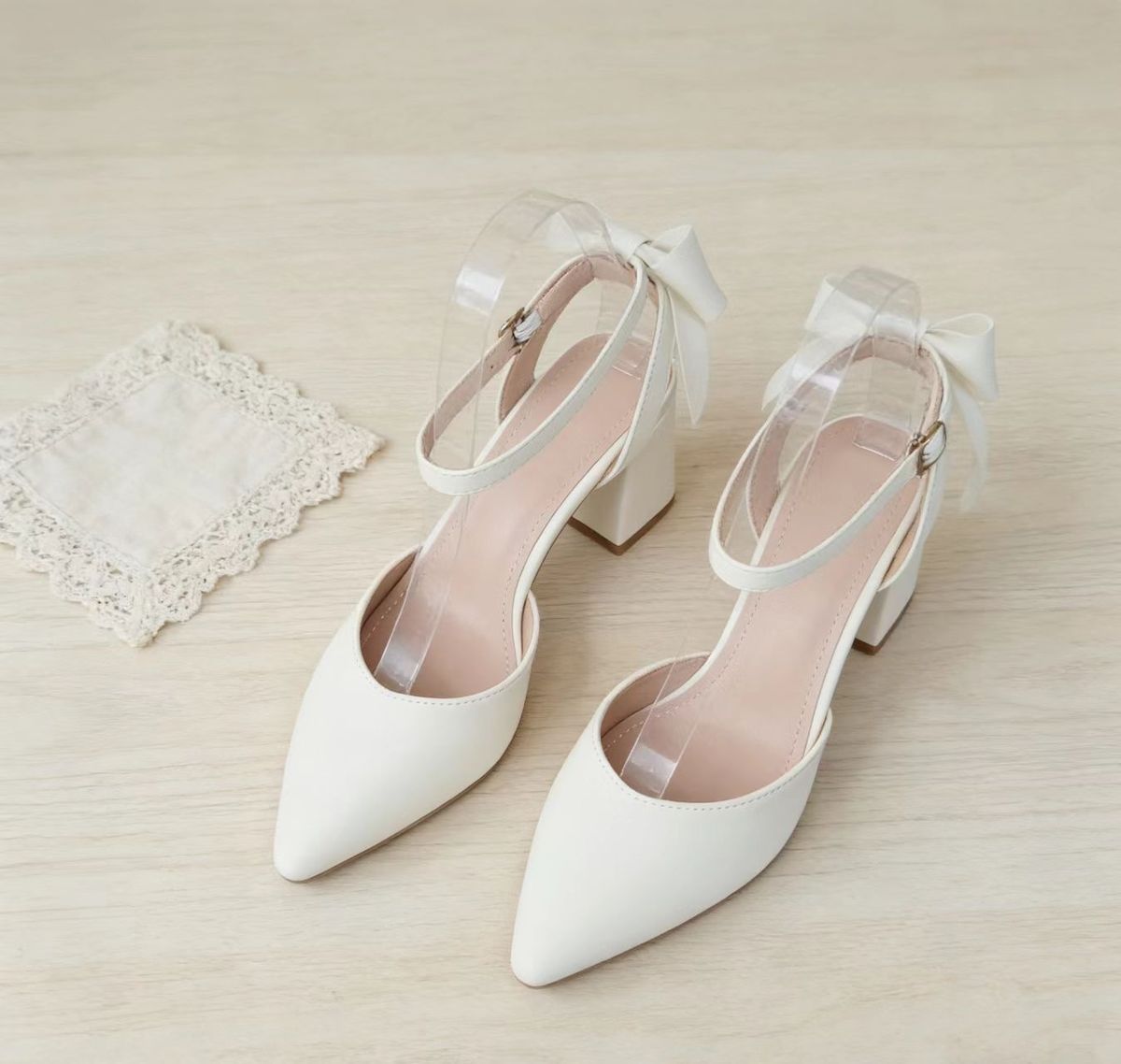 Women's off-white bow chunky heel pointed toe sandals for spring and summer